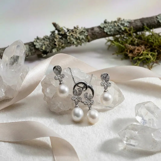 Dangling pearls and CZ with 925 sterling silver. Earrings and pendant set